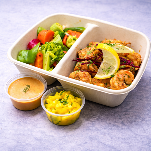 Shrimp with Mango Salsa and jalapeno served with vegetable saute